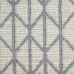 Broadloom carpet swatch in a diamond textured pattern in a blue design