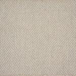 Broadloom carpet in a herringbone pattern in soft beige.