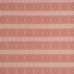 Patterned fabric with orange and cream geometric design