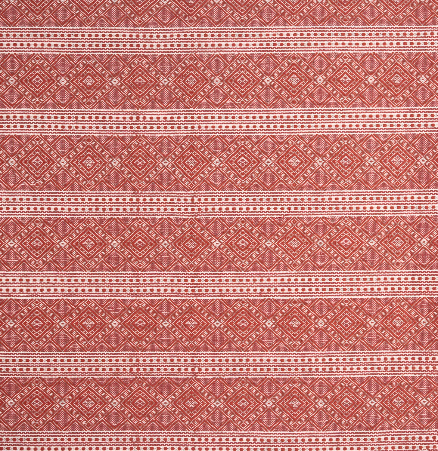 Patterned fabric with red and white geometric design
