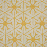 Printed linen in a shibori tie-dye pattern in yellow. 
