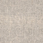 Broadloom carpet with a subtle herringbone pattern in heather grey