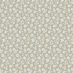 Pattern of small white flowers on a taupe background