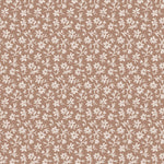 Pattern of small white flowers on a terracotta background