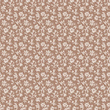 Pattern of small white flowers on a terracotta background