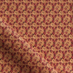 Fabric with small scale watercolor floral in red and orange.
