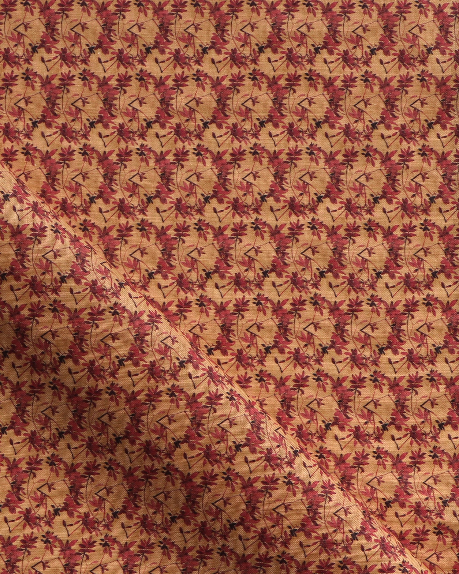 Fabric with small scale watercolor floral in red and orange.