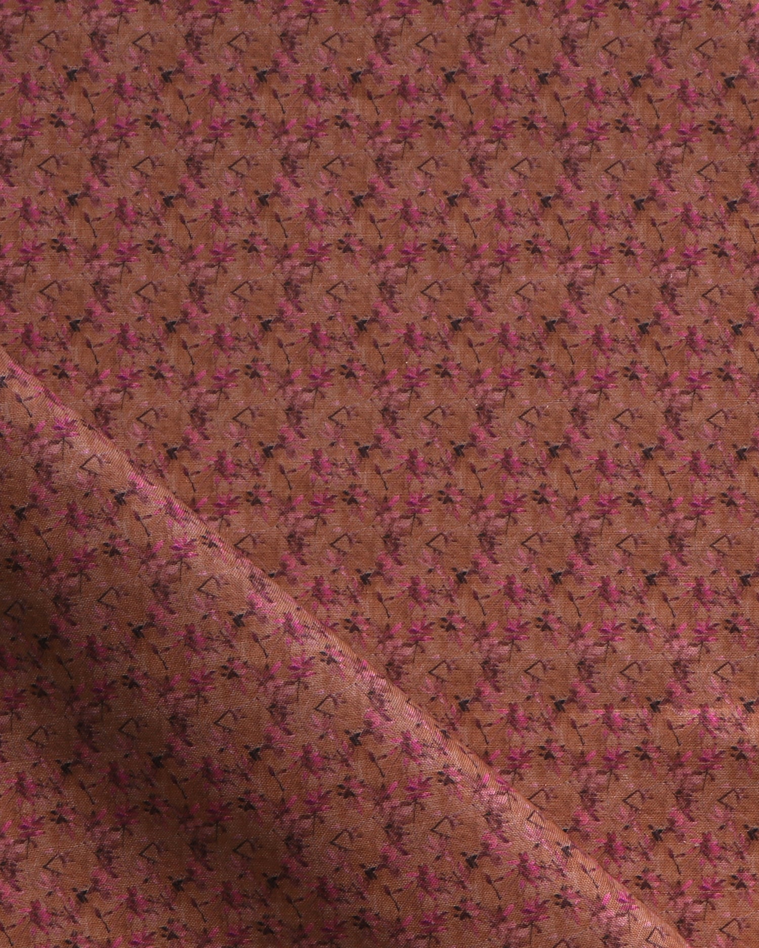 Fabric with small scale watercolor floral in purple on brown.