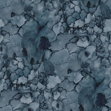 Detail of wallpaper in a watercolor textural print in shades of blue, navy and black.