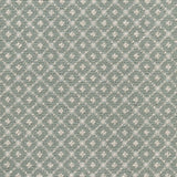 Broadloom carpet with dotted lattice in cream on an aqua blue field. 