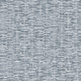 Detail of wallpaper in a textural checked print in navy on a white field.