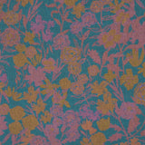 Detail of fabric in a dense small-scale floral print in shades of purple and gold on a navy field.