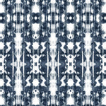 Detail of wallpaper in a painterly ikat print in navy and white.