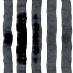 Wallpaper close up with bold watercolor stripes in black and white. 