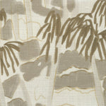 Close-up of fabric in a painterly palm tree print in shades of gray and gold on a white field.