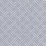 Broadloom carpet with ivory double line lattice on a sky blue field. 
