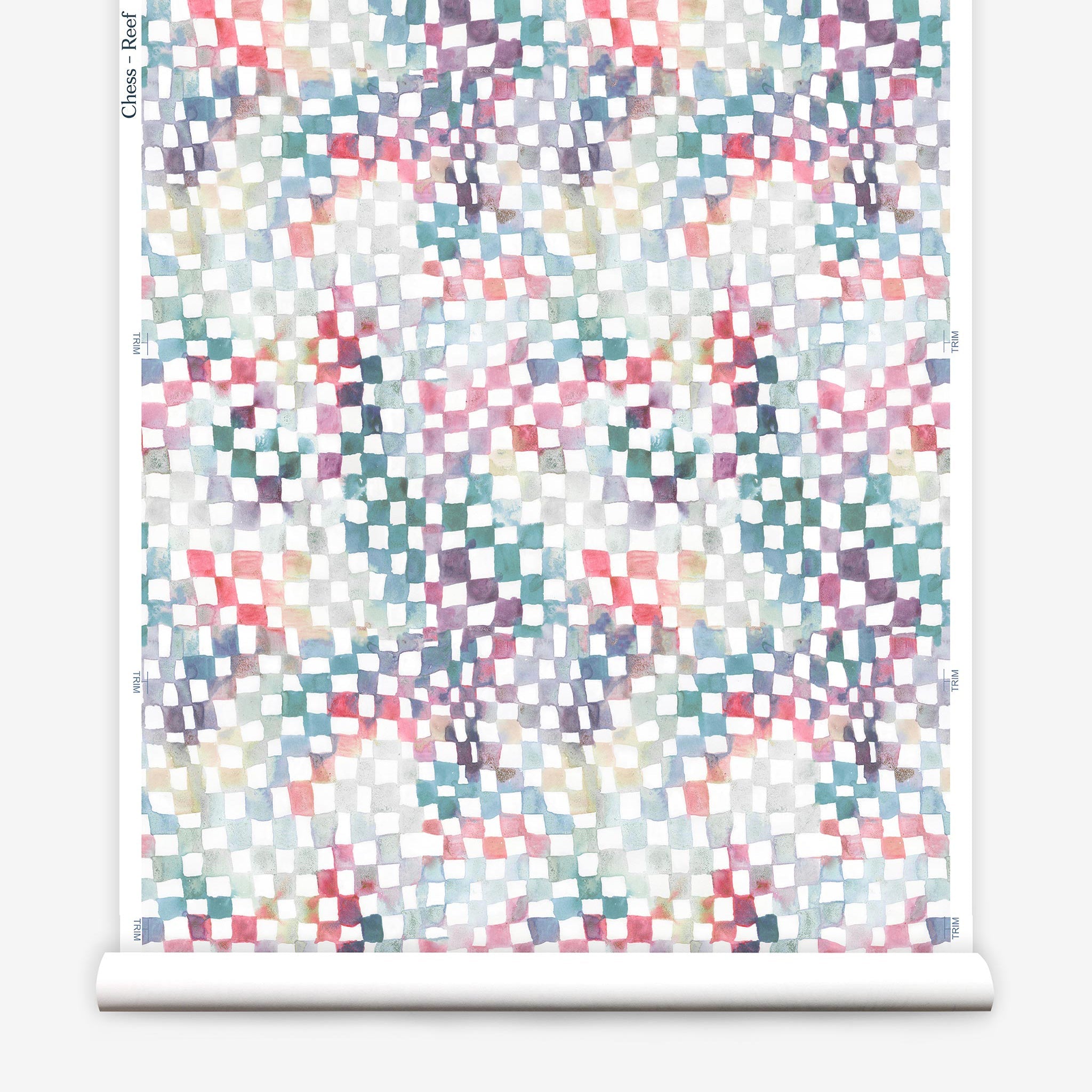 Partially unrolled wallpaper yardage in a painterly chess board print in a rainbow of pastel shades on a white field.