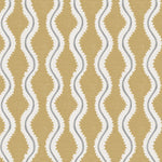 Detail of fabric in a playful curvy stripe print in white and gray on a mustard field.