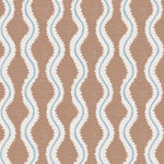 Detail of fabric in a playful curvy stripe print in white and blue on a brown field.