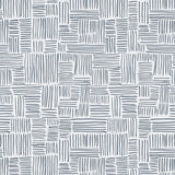 Detail of wallpaper in a directional dash pattern in blue-gray on a white field.