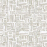 Detail of wallpaper in a directional dash pattern in cream on a white field.
