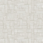 Detail of wallpaper in a directional dash pattern in white on a cream field.
