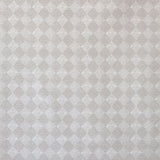 Detail of fabric in a textural diamond print in cream.