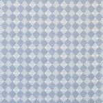 Detail of fabric in a textural diamond print in light blue and white.
