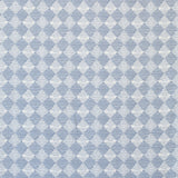 Detail of fabric in a textural diamond print in light blue and white.