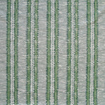 Detail of fabric in a dense tribal stripe pattern in shades of gray and green.