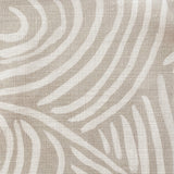 Close-up of fabric in an abstract linear print in white on a cream field.