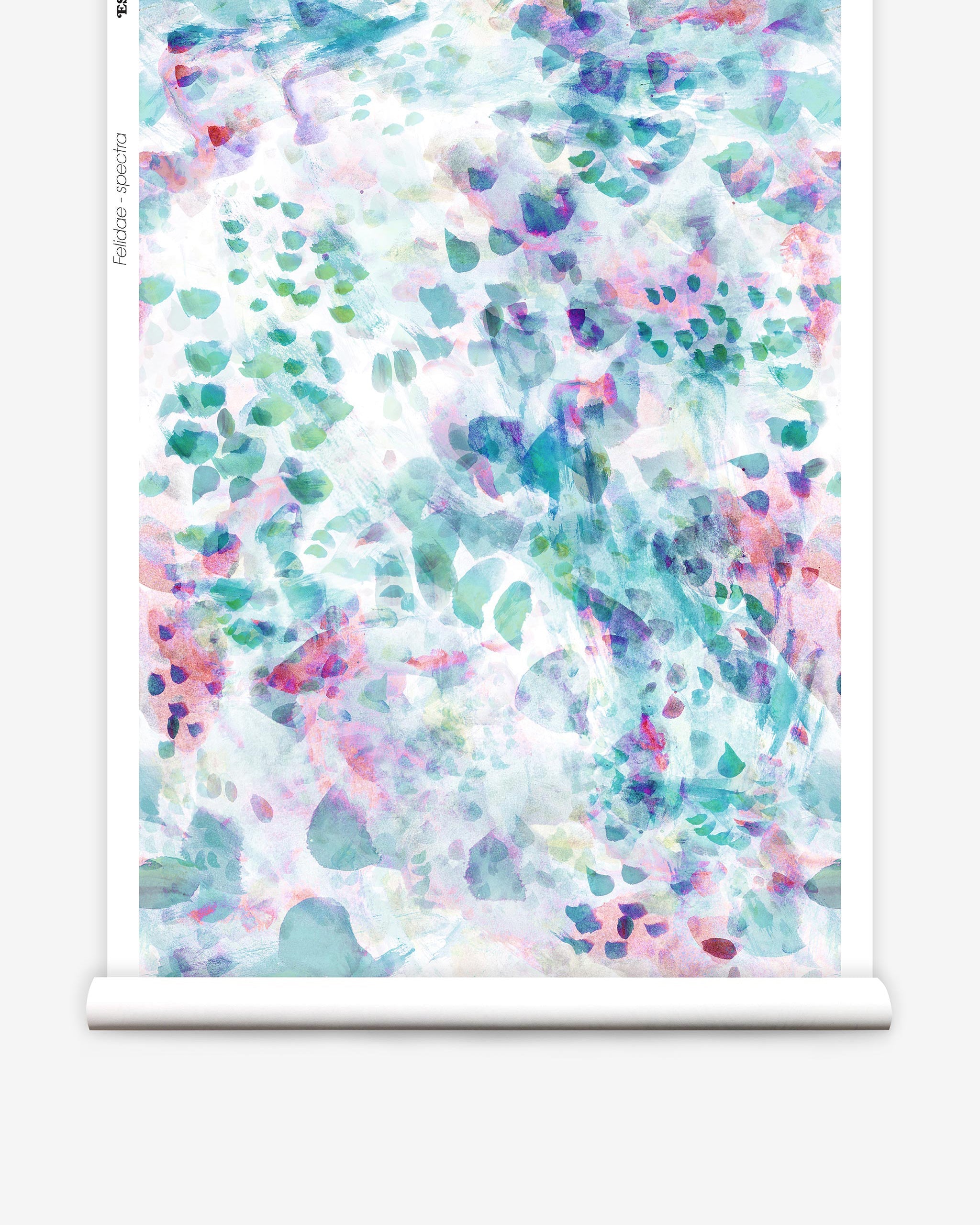 Partially unrolled wallpaper yardage in a watercolor paint blotch print in pink, green, turquoise and white.