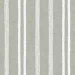 Detail of wallpaper in a textural stripe pattern in white on a greige field.