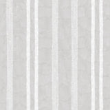 Detail of wallpaper in a textural stripe pattern in white on a light gray field.