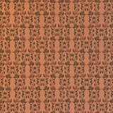 Detail of wallpaper in a linear floral print in red and black on an orange field.
