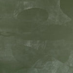 Detail of wallpaper in an abstract textural pattern in shades of green.