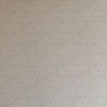 Detail of wallpaper in a painterly leaf print in black on a greige field.