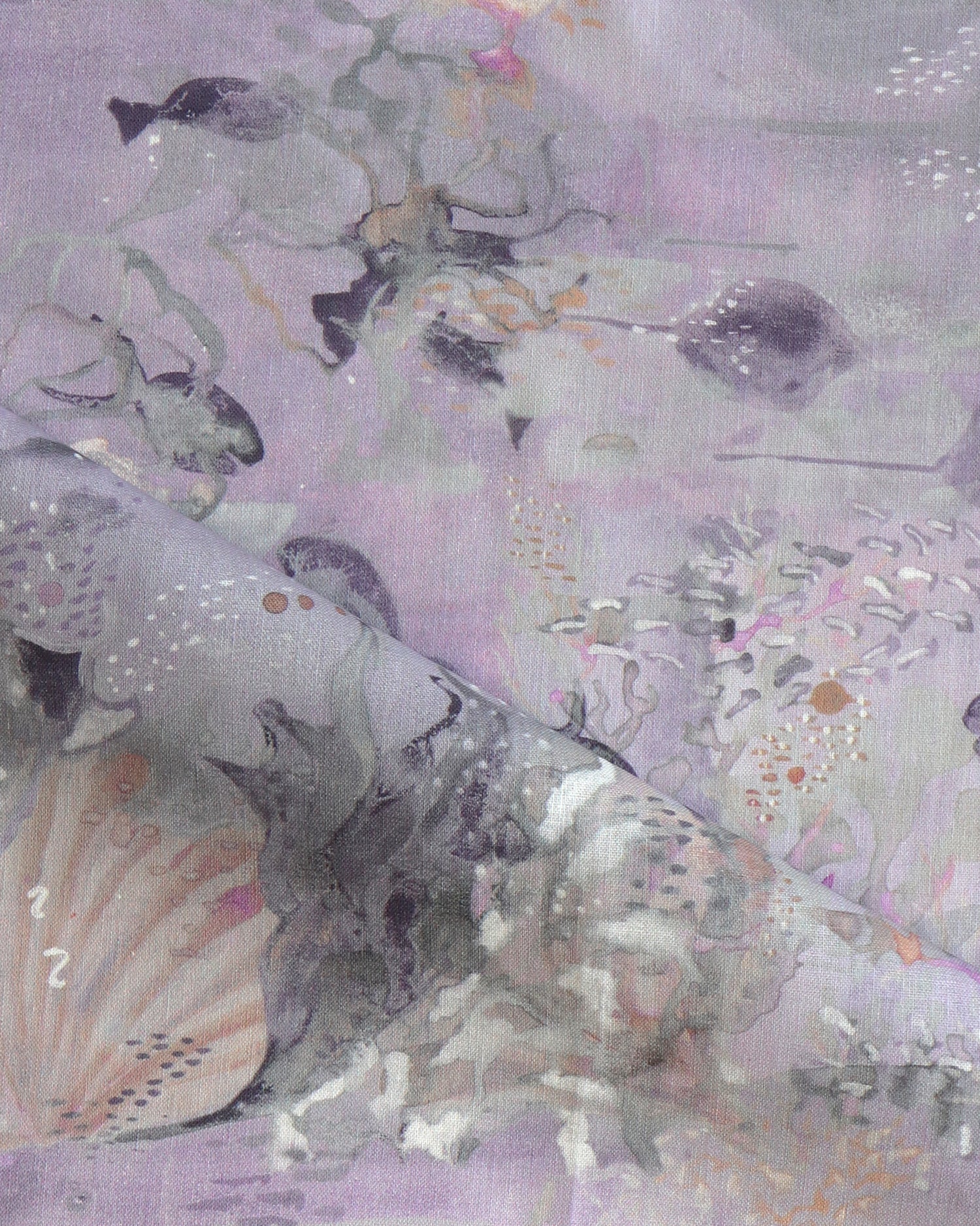 Draped fabric in an underwater sealife scene in shades of light purple. 