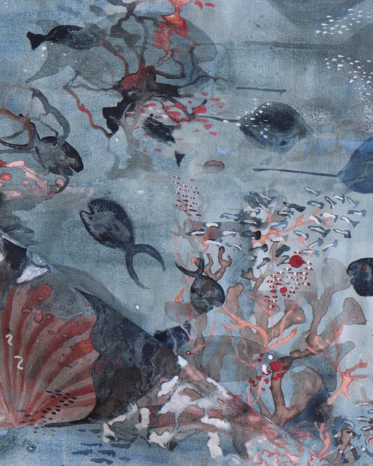 Draped fabric in an underwater sealife scene in shades of blues with red accents. 