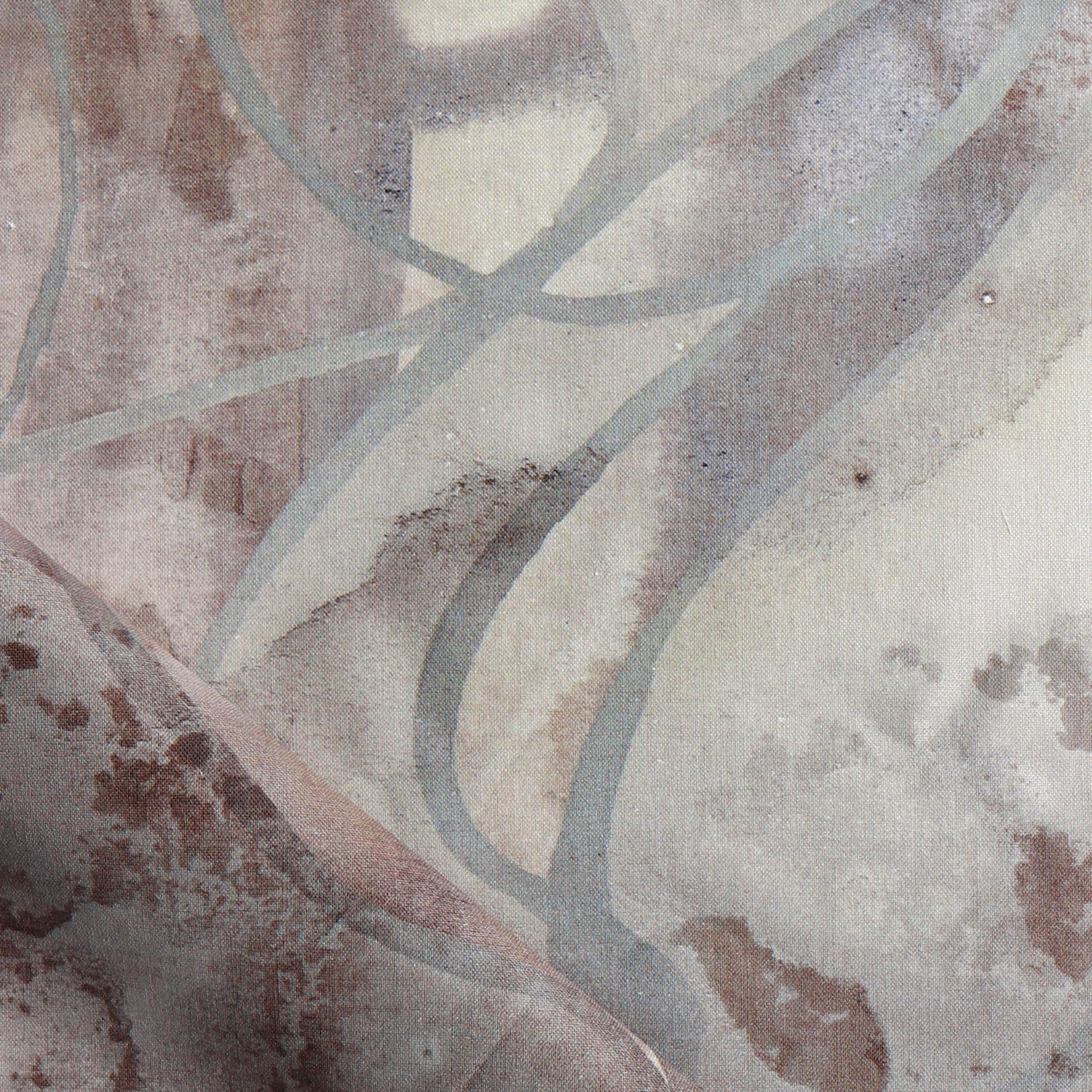 Draped fabric in abstract floral bushstroke design in soft brown with grey. 