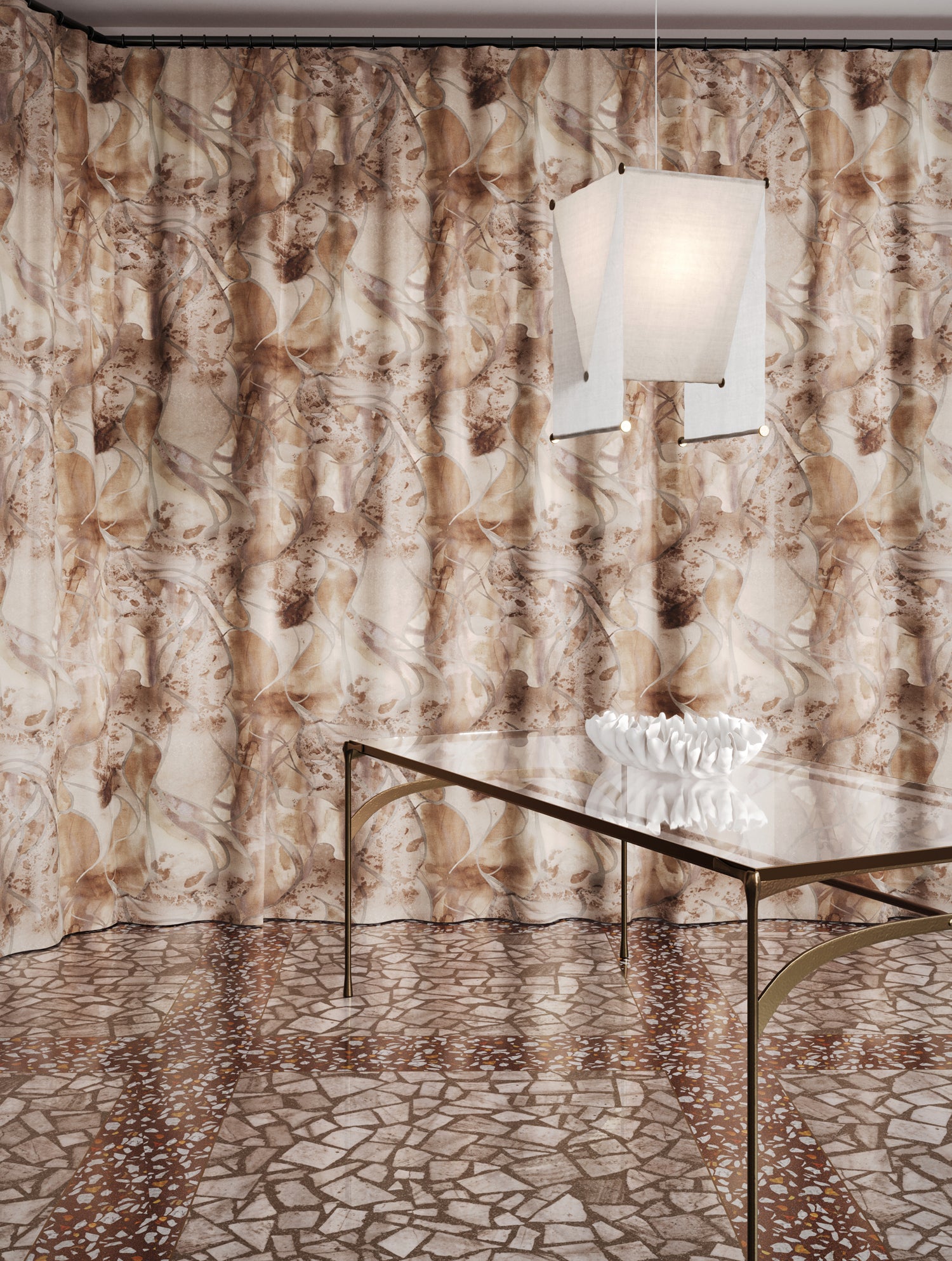 Floor length curtain in  abstract floral bushstroke design in soft brown with grey with a metal and glass table. 