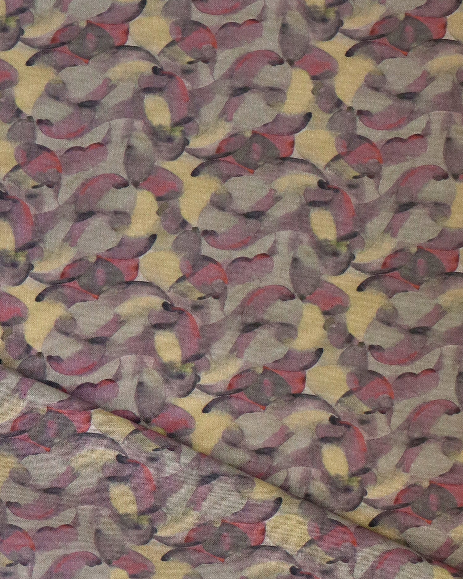 Draped fabric in an undulating abstract watercolor motif in purple, taupe, yellow and charcoal. 