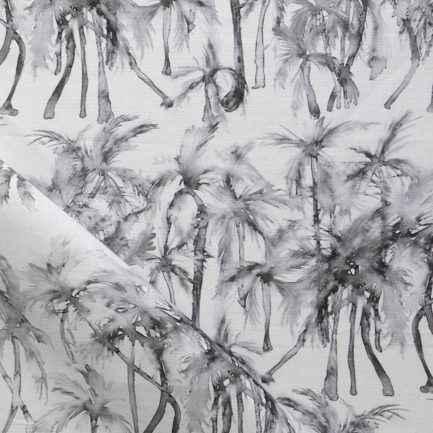 Detail of draped fabric in a painterly palm tree stripe print in shades of gray on a white field.