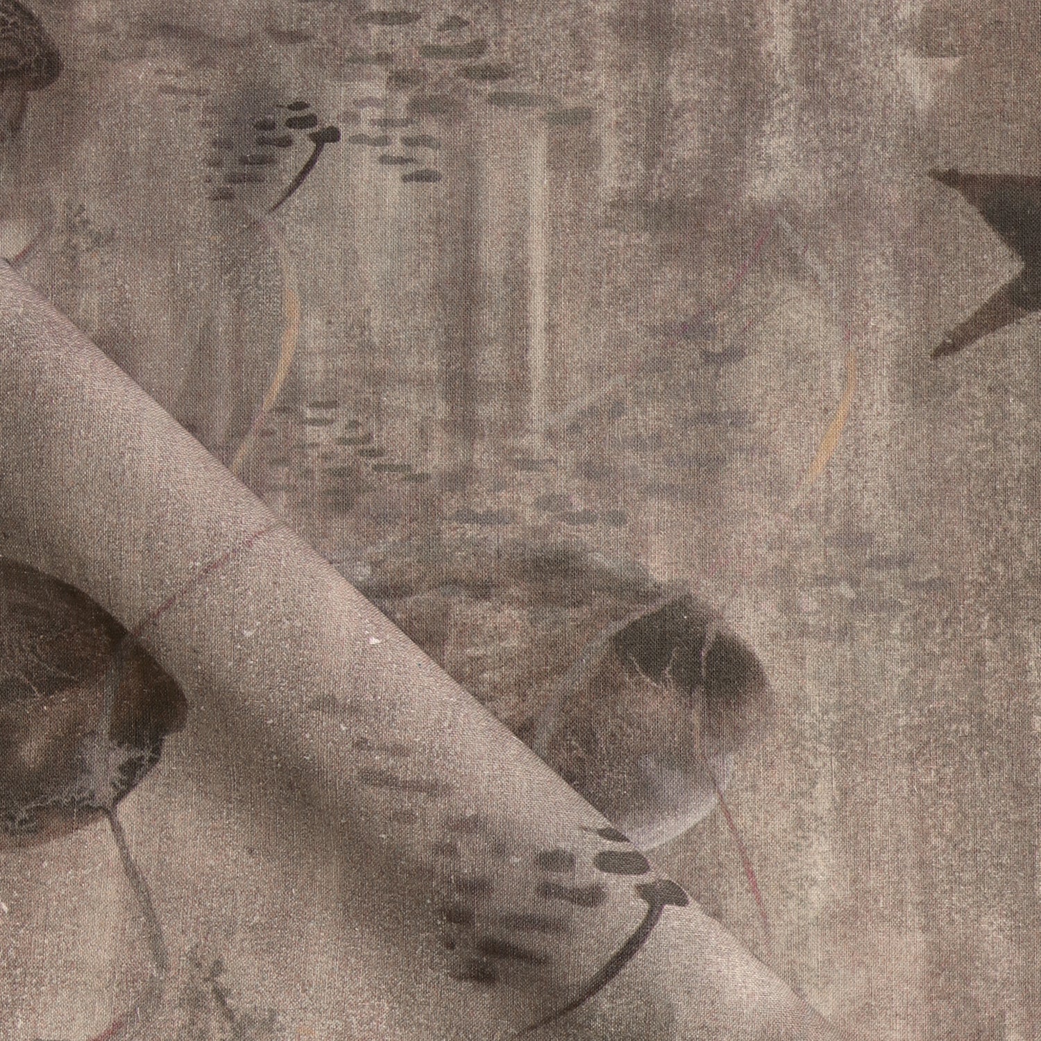 Draped fabric in an watercolor oceanic fish pattern in warm taupe.