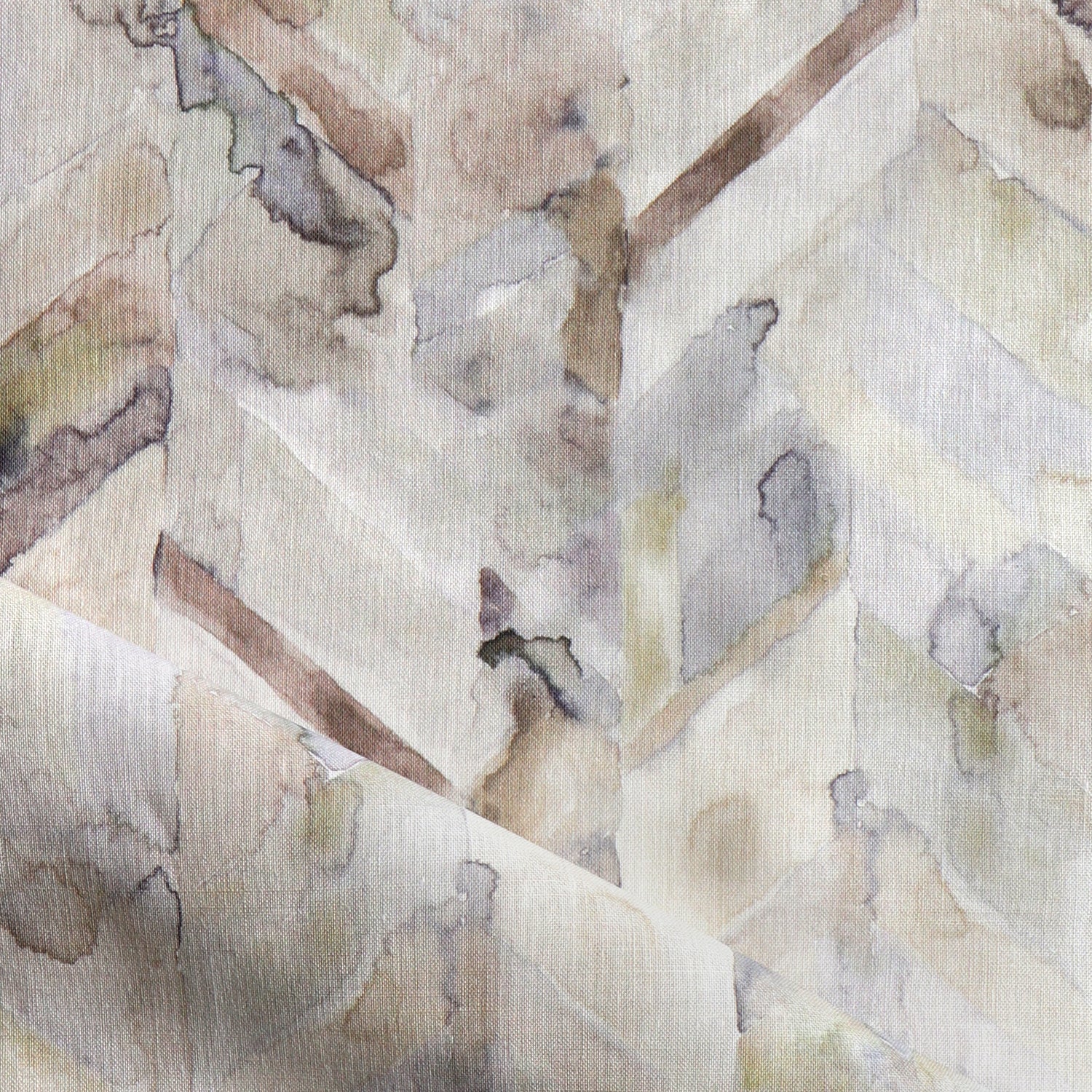 Detail of draped fabric in a painterly herringbone print in shades of gray, tan and cream.