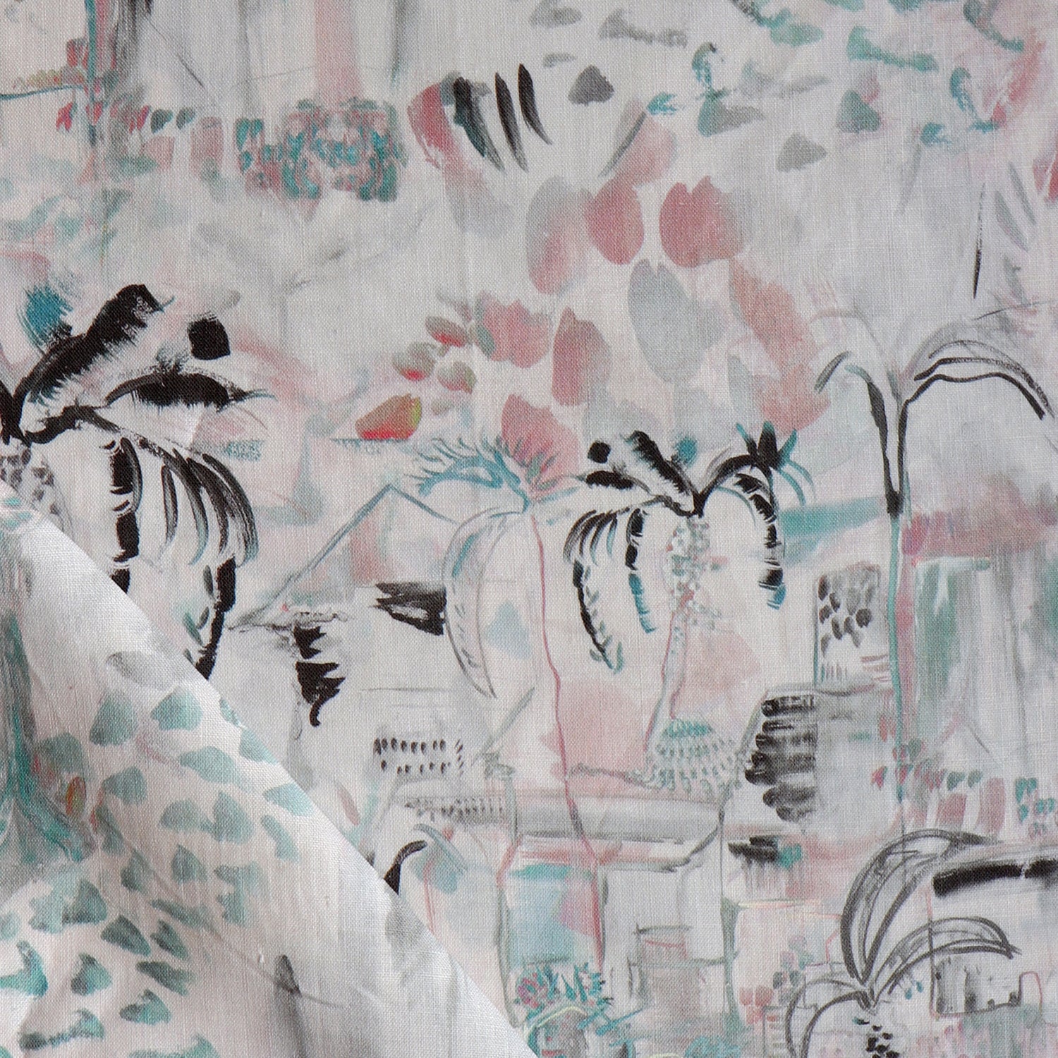 Detail of draped fabric in a painterly tree print in shades of gray, pink and turquoise.
