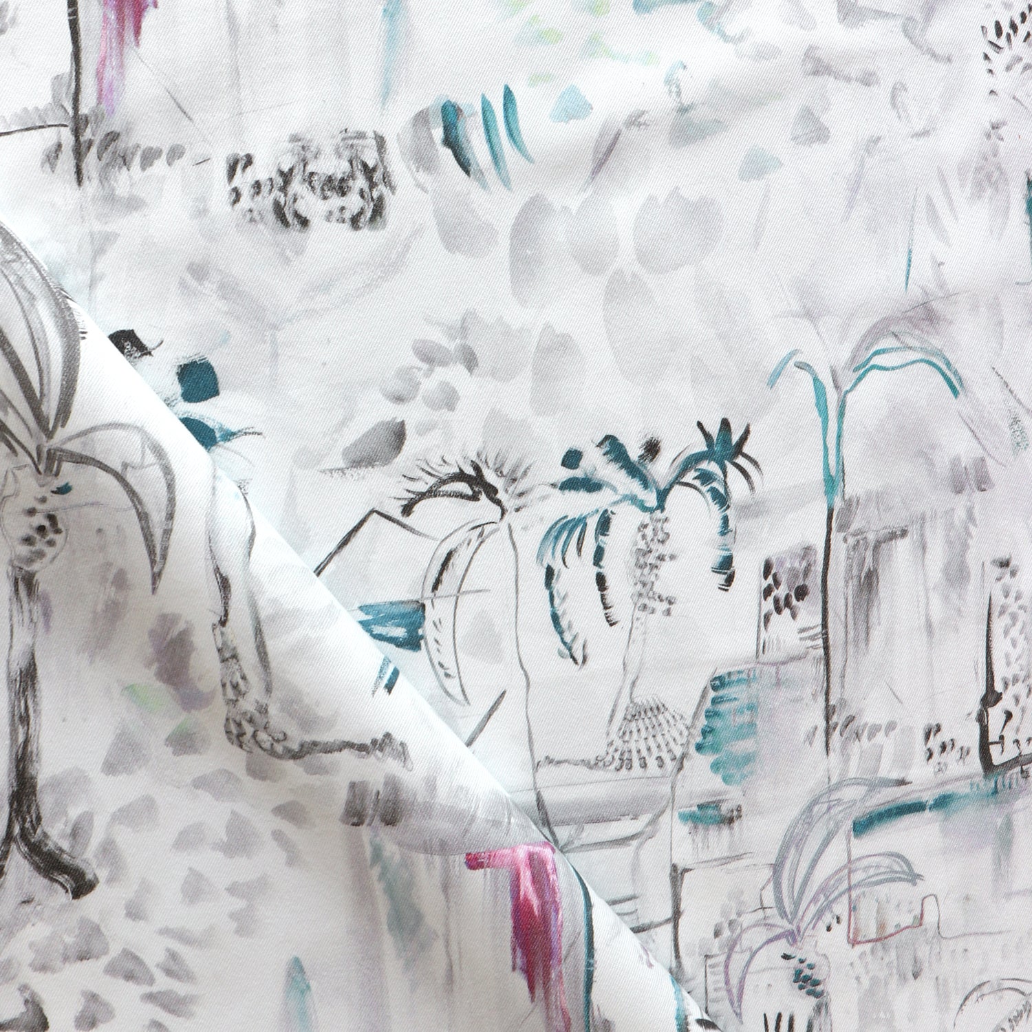 Detail of draped fabric in a painterly tree print in shades of gray, white, turquoise and pink.
