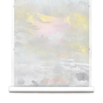 Wallpaper roll of an ethereal watercolor mural in shades  blush pink, yellow, aqua and grey. 