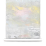 Wallpaper roll of an ethereal watercolor mural in shades  blush pink, yellow, aqua and grey. 