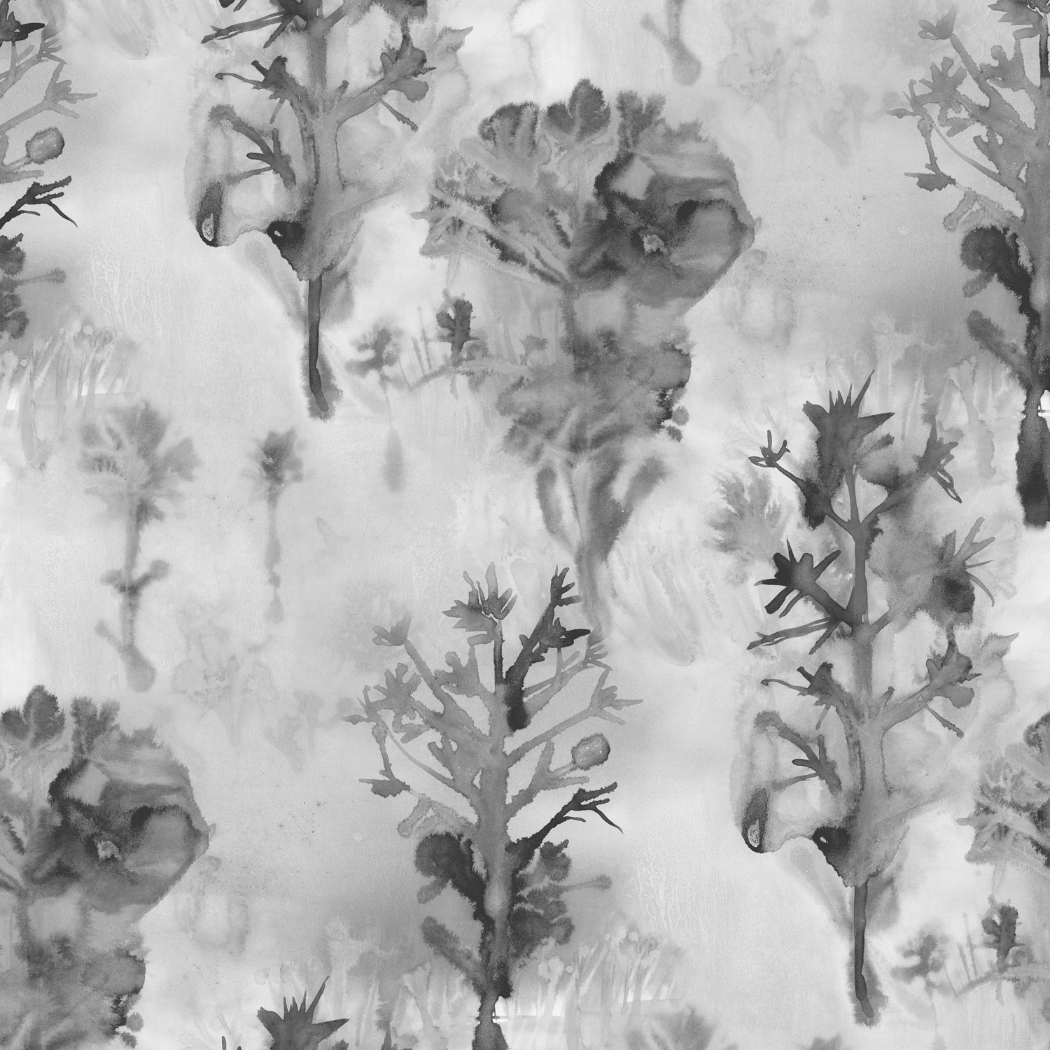 Detail of wallpaper in a watercolor tree print in shades of gray and black on a white field.